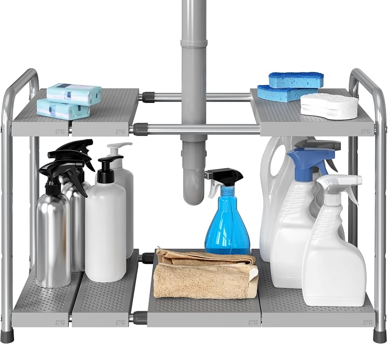 Silver two-shelf organizer under a sink, around a pipe